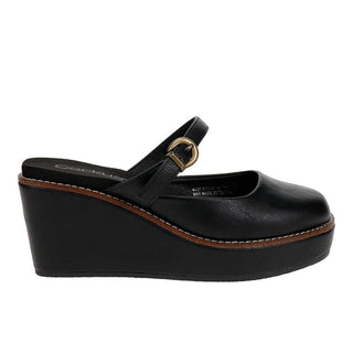 A black leather wedge mule sandal with a single strap and a gold-tone buckle, shown from a side profile view on a white background.