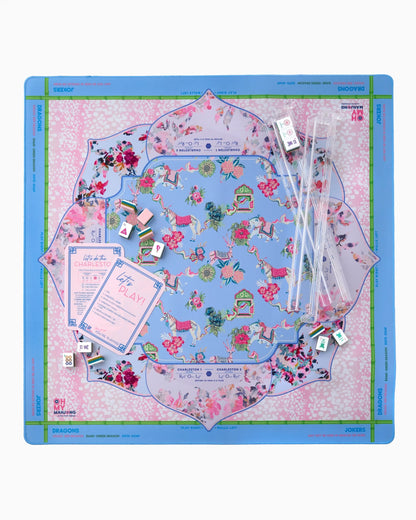 Board game with colorful design on a pink and blue board