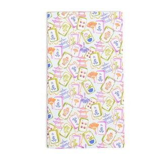A rectangular fabric item, likely a towel or blanket, featuring a colorful Japanese-inspired pattern of shakeru (fortune tag) envelopes, pagoda silhouettes, and kanji characters on a white background.