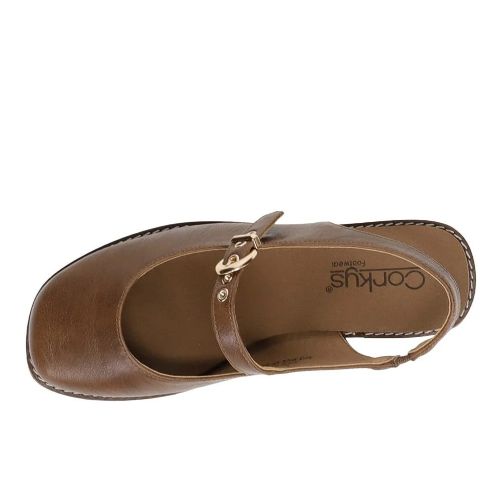 A single brown leather Mary Jane flat shoe shown from a top-down view, featuring a round toe, a strap with a small gold-tone buckle, and a visible corky insole with the brand name Corks.