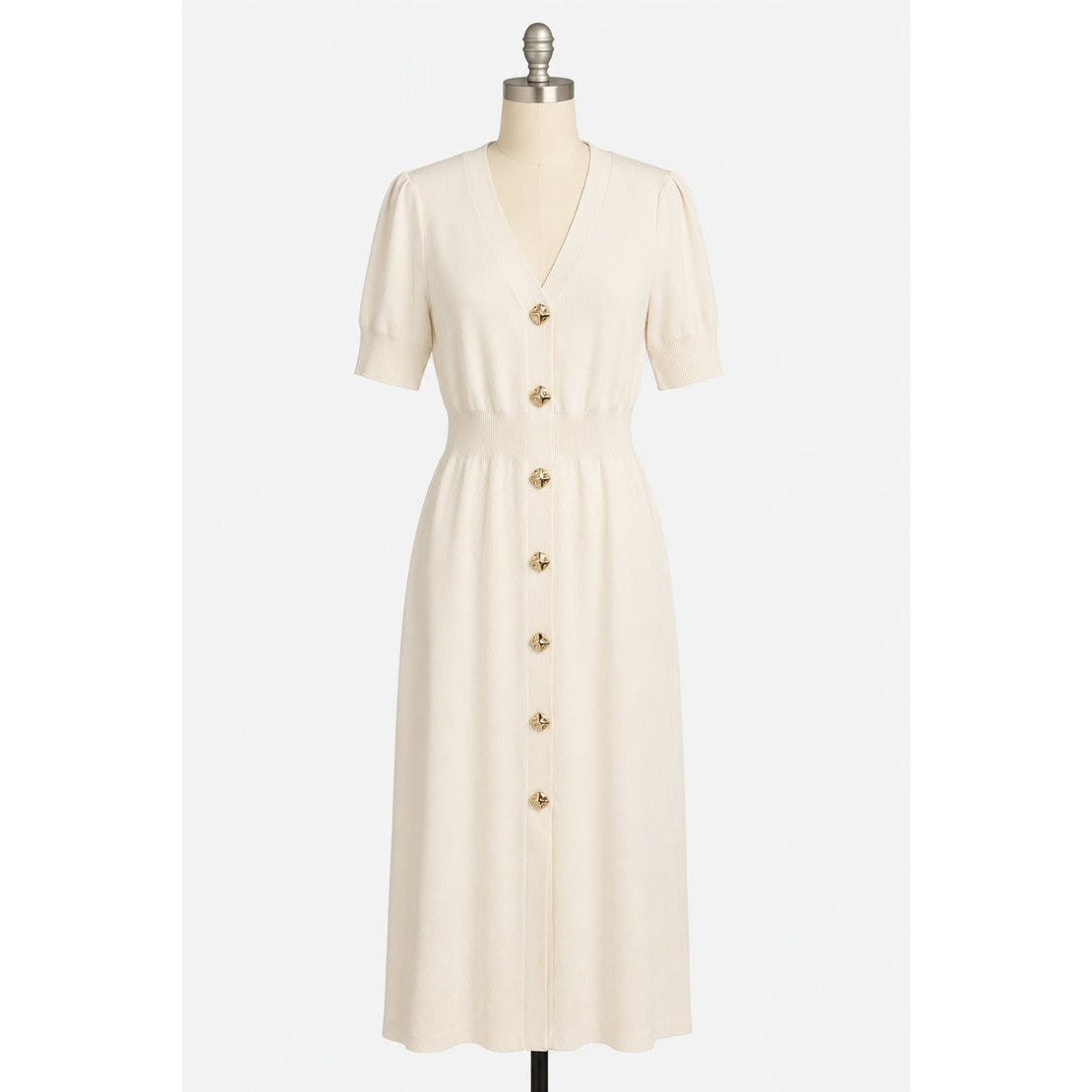 An off-white midi dress with short puff sleeves, a V-neckline, and a front button closure, displayed on a mannequin against a light gray background.