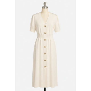 An off-white midi dress with short puff sleeves, a V-neckline, and a front button closure, displayed on a mannequin against a light gray background.