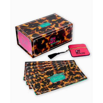 Leopard print product set with 'Oh My' packaging on a white background